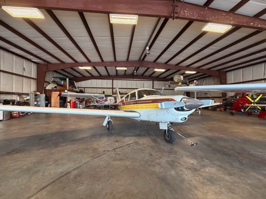 Blackstone Aviation's Comanche 180 in the hangar